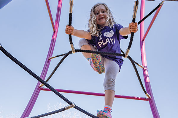 kid playing in playground